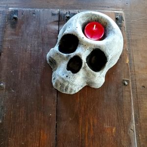 Concrete skull tea light holder